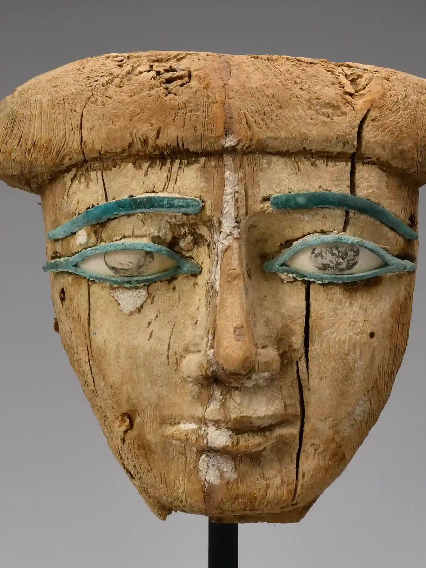 古代エジプト 木彫の面（棺の顔貌部・象嵌の眼が残る）——木彫り・彫刻の買取例